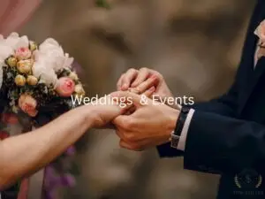 Wedding ceremony with rings, flowers, and celebration details